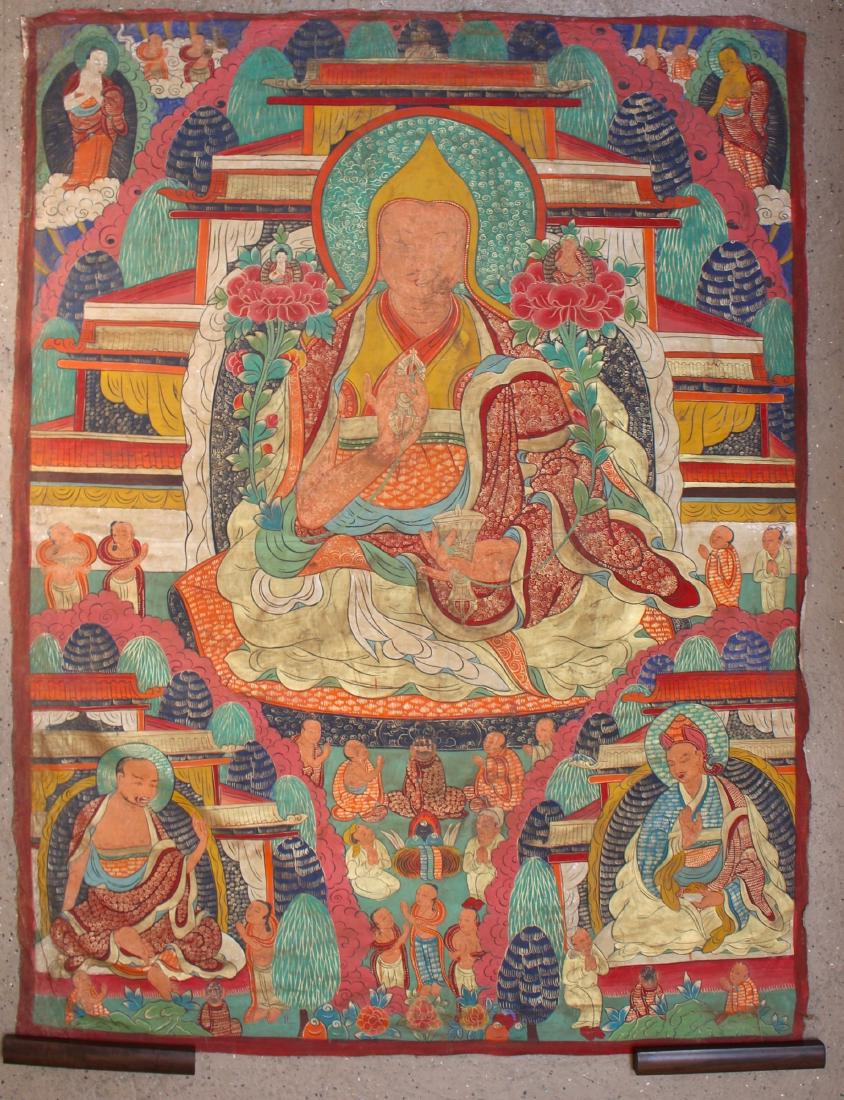 BUDDHA THANGKA: BUDDHA THANGKA: The Buddha is seated on a pedestal holding a vajra in one hand and a censer in the other, and stems in each that grow up to pink lotuses with smaller Buddhas seated in each. Besides th