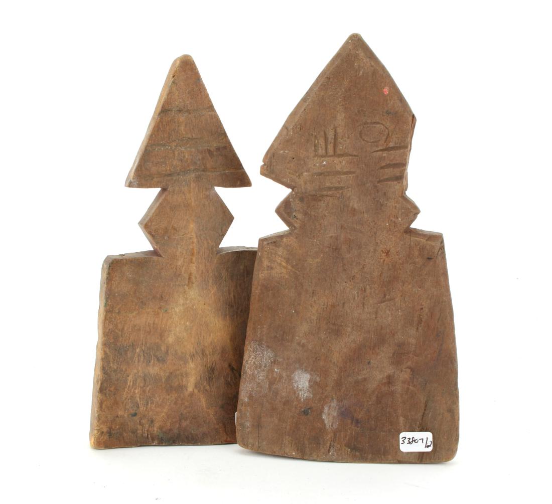 TWO CARVED WOODEN SPEAR HEADS: TWO CARVED WOODEN SPEAR HEADS: Triangular tops and slightly incised. 6 1/4" X 3" $300 - $500 Shipping: We are able to pack