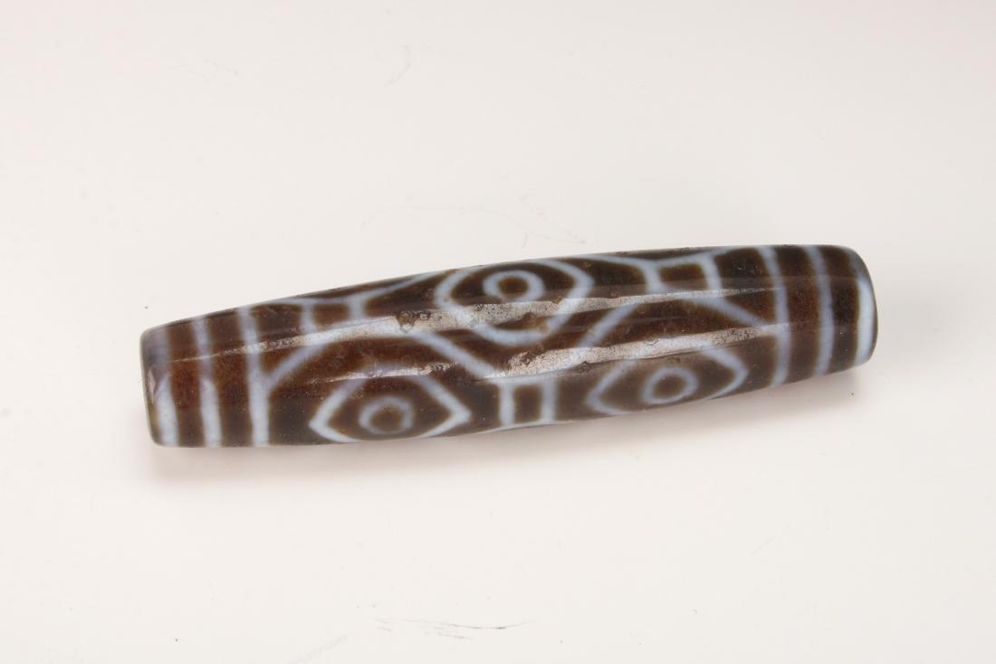 LONG SIX EYE DZI BEAD (1 of 4)
