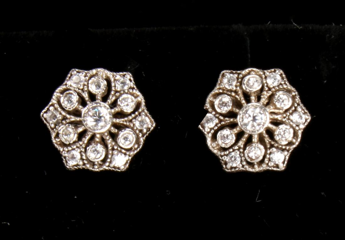 ROMANTIC STERLING FILIGREE CRYSTAL STUD EARRINGS: ROMANTIC STERLING FILIGREE CRYSTAL STUD EARRINGS: Lacy hexagonal stud earrings each with seven sparkling crystals. Perfect for special occasions or every day. Marked 925. $150 - $250 <