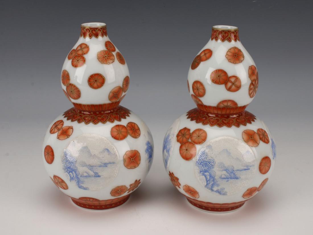 PAIR OF QIANLONG SNOW SCENE DOUBLE GOURD VASES (1 of 7)