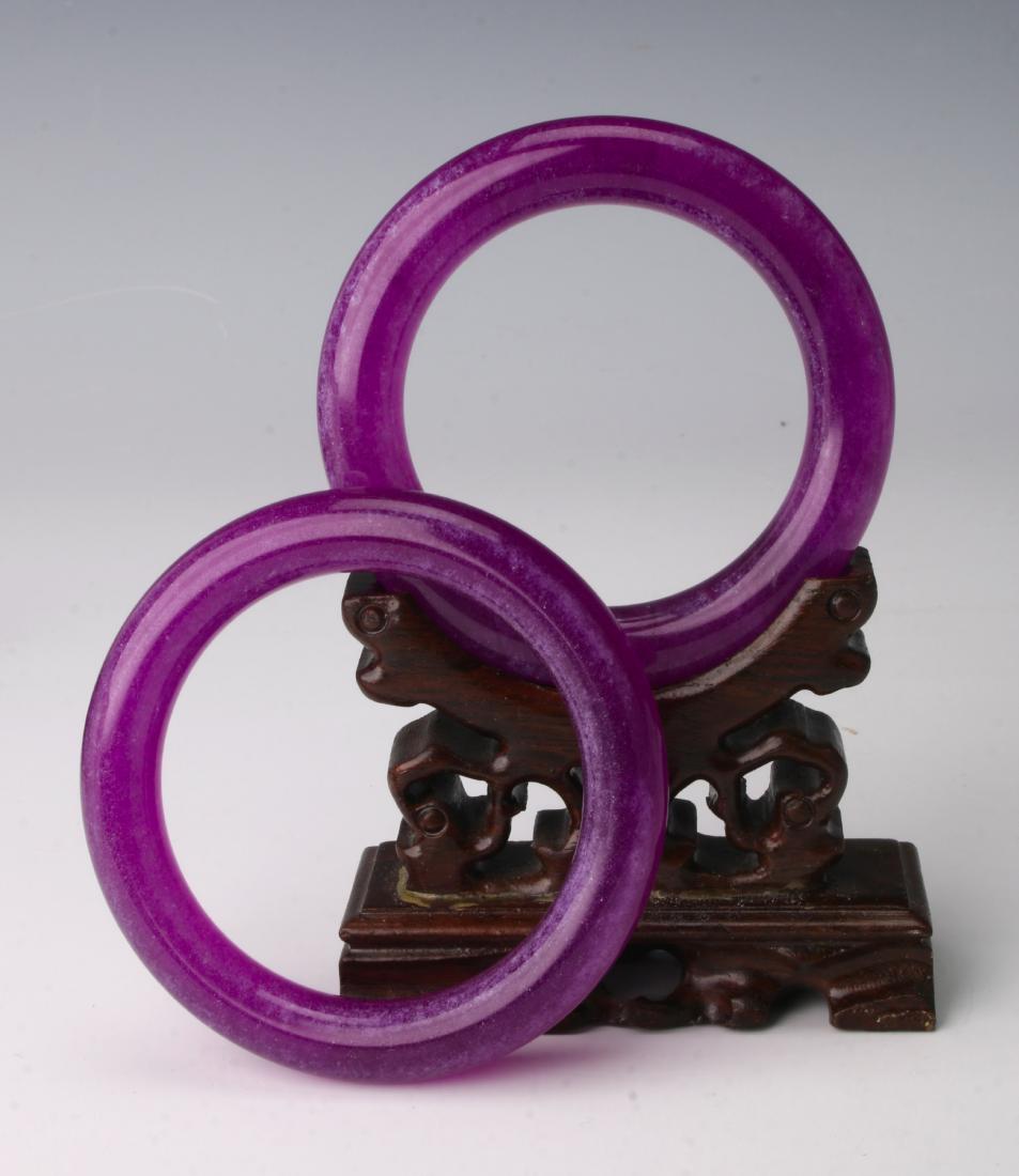 PAIR OF PURPLE JADE BANGLES (1 of 4)