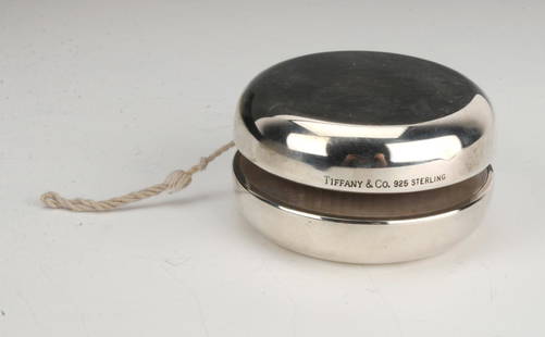 TIFFANY & CO. STERLING YO-YO: TIFFANY & CO. STERLING YO-YO: Sterling yo - yo for the child and child at heart who has everything. By Tiffany & Co. 2 1/4" X 1 1/2" $400 - $600