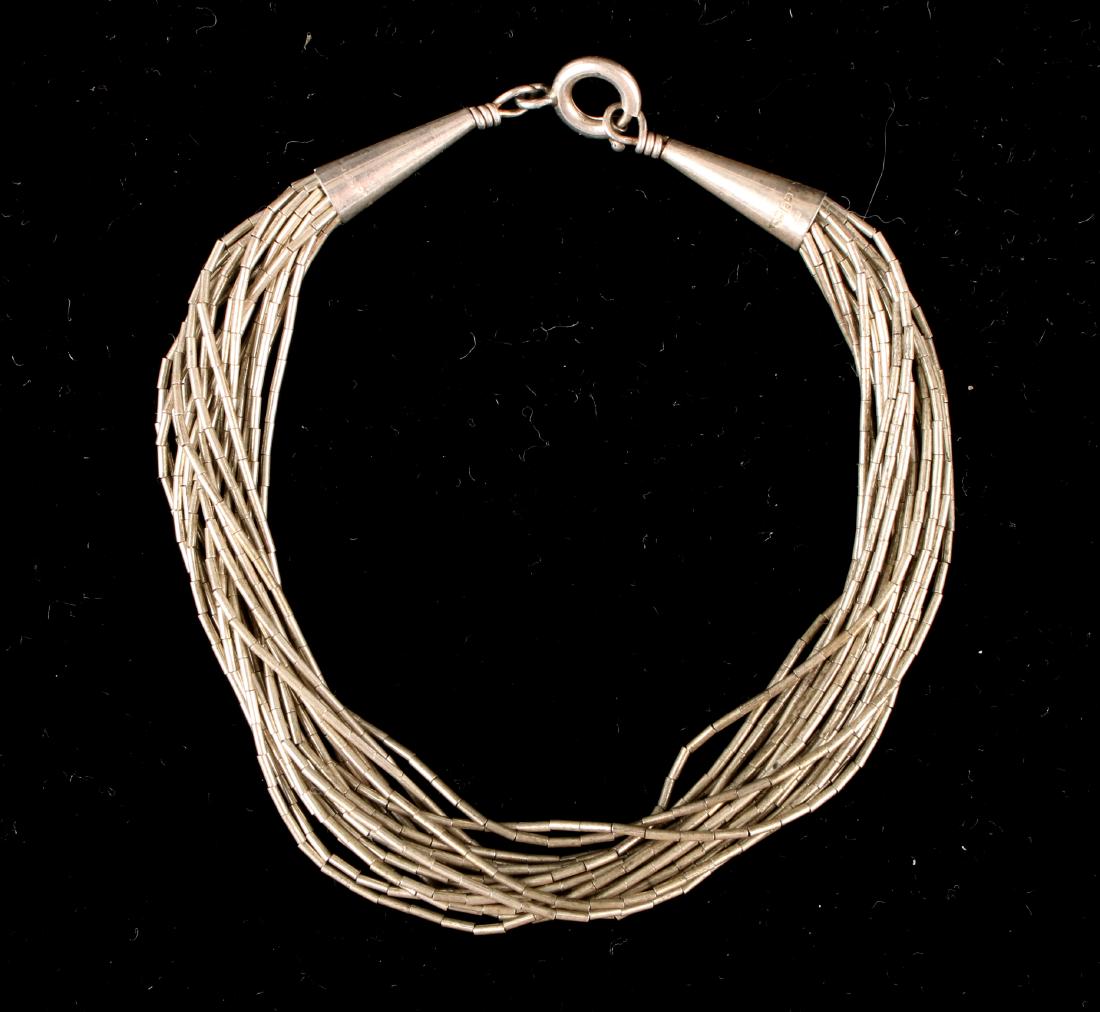 TWENTY STRAND LIQUID SILVER BRACELET (1 of 4)