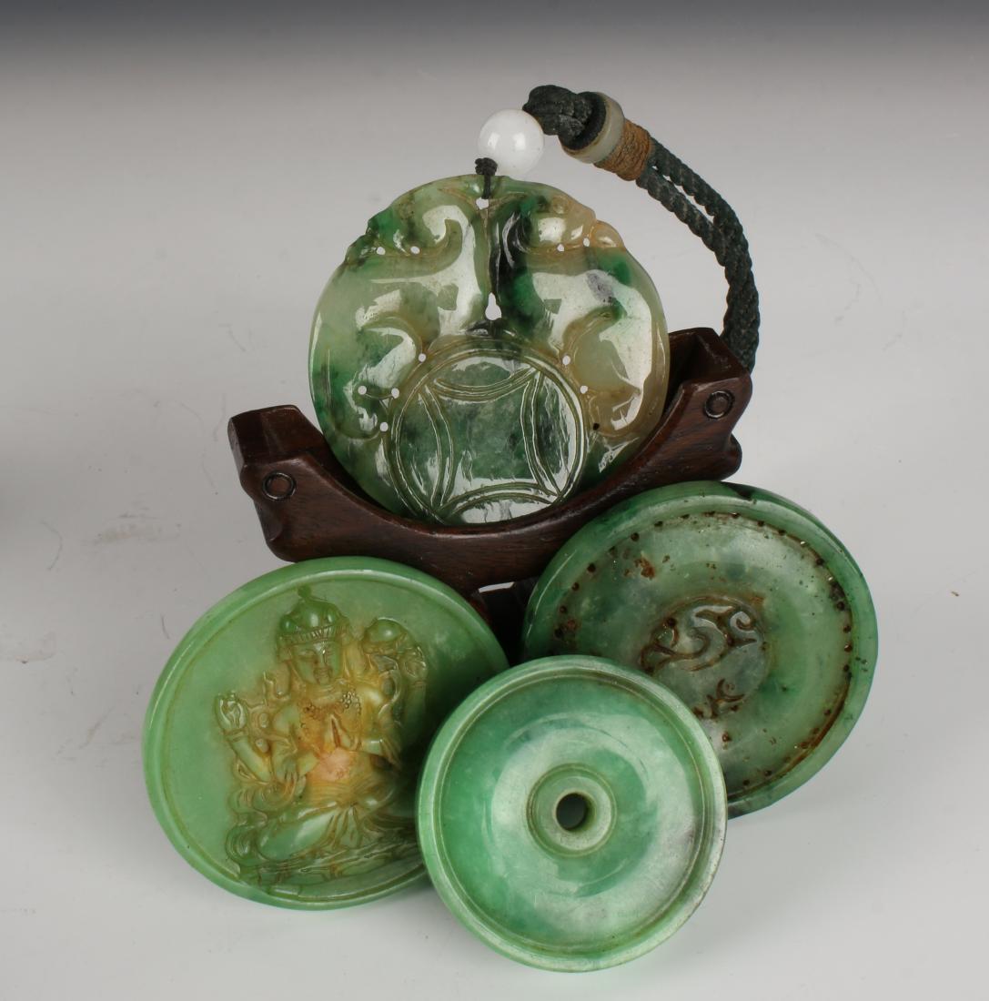 FOUR JADE MEDALLION PENDANTS (1 of 7)