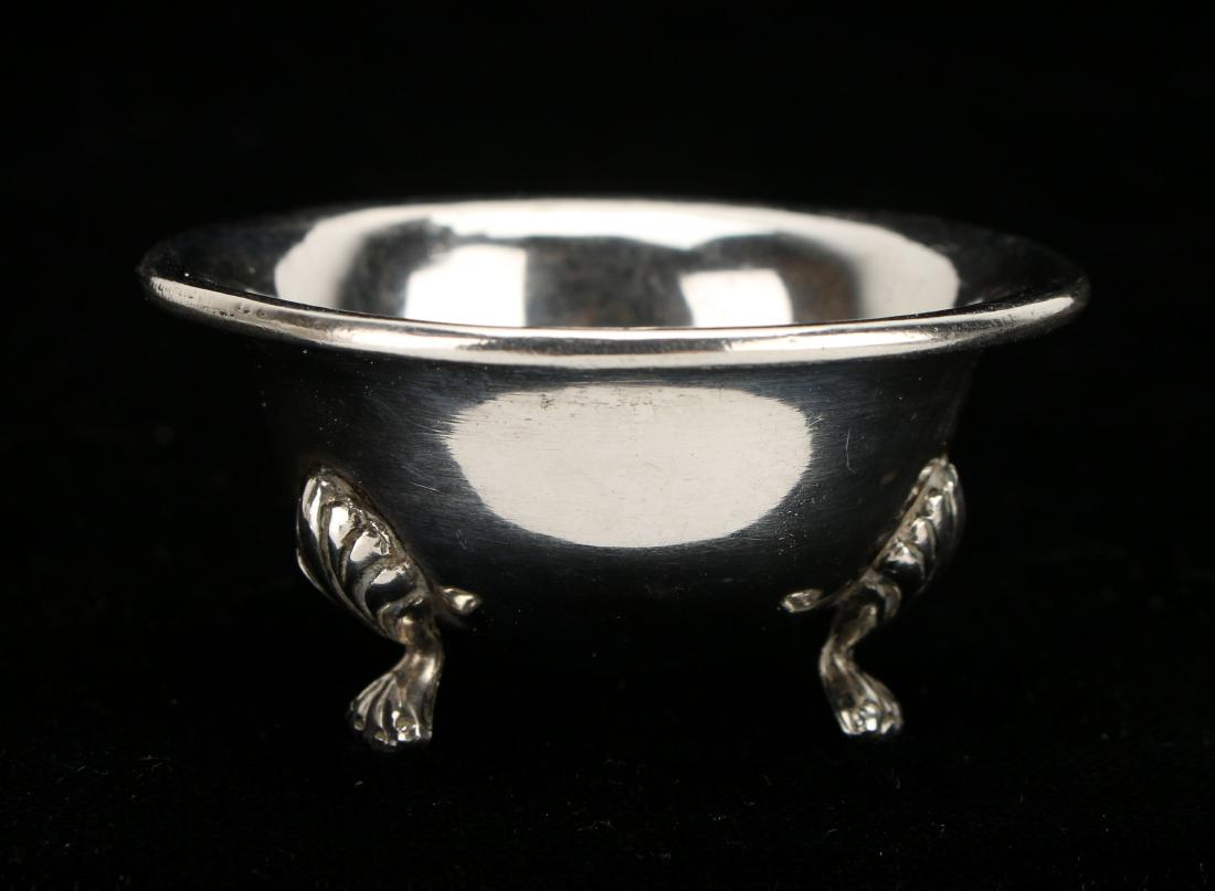 YUCHANG STERLING SALT CELLAR: YUCHANG STERLING SALT CELLAR: Sterling salt cellar on three lion's paw feet. 2" X 1" $100 - $200 Shipping: We are able to