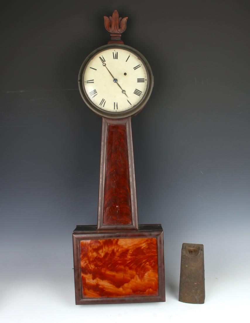 NEW HAMPSHIRE BANJO CLOCK: NEW HAMPSHIRE BANJO CLOCK: The glasses are reverse painted in grain patterns. 30" X 10" $1000 - $1500 Shipping: We are un