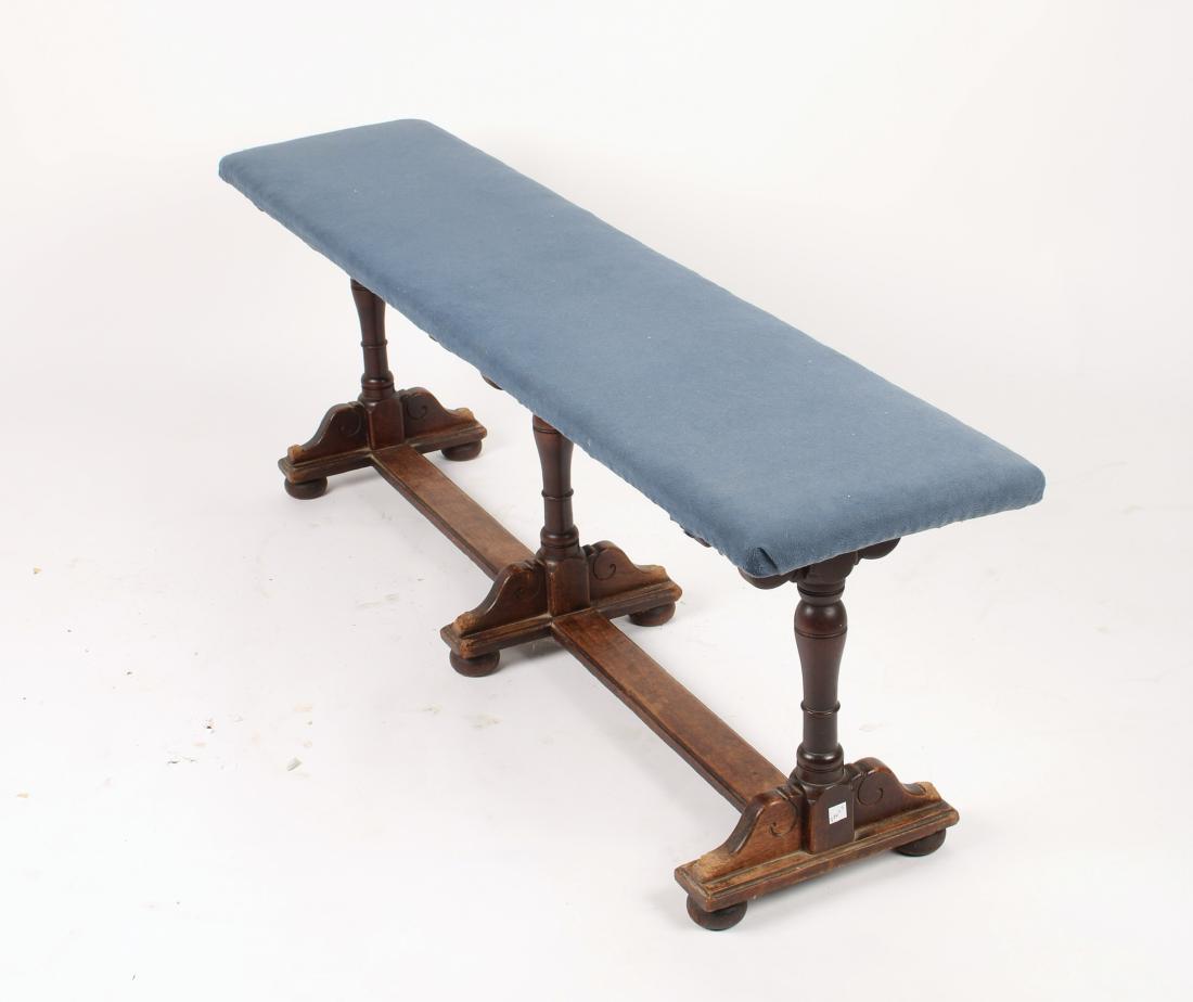 BENCH WITH URN FORM LEGS: BENCH WITH URN FORM LEGS: Curvilinear support brackets, on three supporting legs with bun feet. Seat is upholstered. 48" X 10 1/2" X 16" $200 - $400