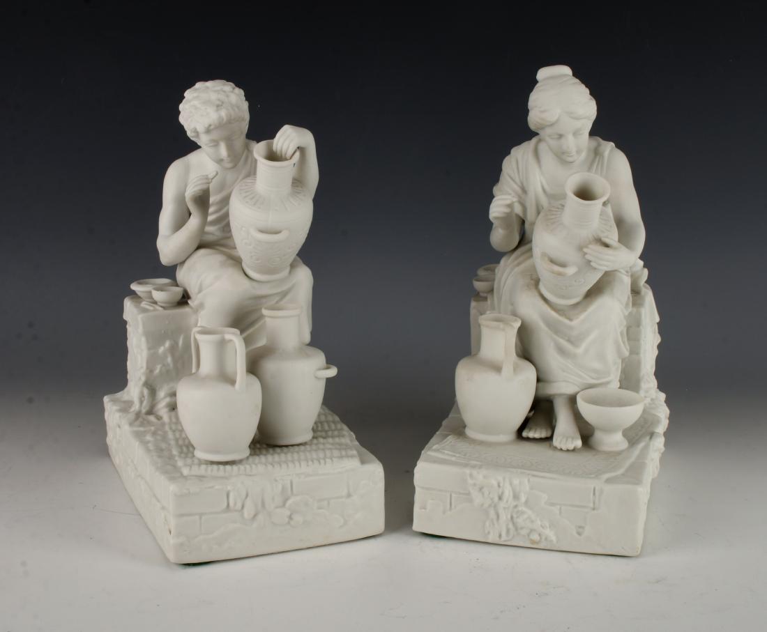PARIAN WARE FIGURAL BOOKENDS: PARIAN WARE FIGURAL BOOKENDS: A pair of parian ware (bisque porcelain) figural bookends depicting male and female painters of pottery, on rectangular bases. The figures ar