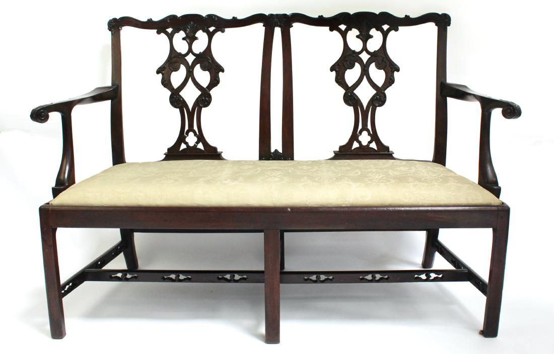 ANTIQUE GEORGIAN DOUBLE CHAIR BACK SETTEE: ANTIQUE GEORGIAN DOUBLE CHAIR BACK SETTEE: Double chair back settee in Chippendale style. With single upholstered bench seat. 58 1/2" X 26" X 38 1/2"