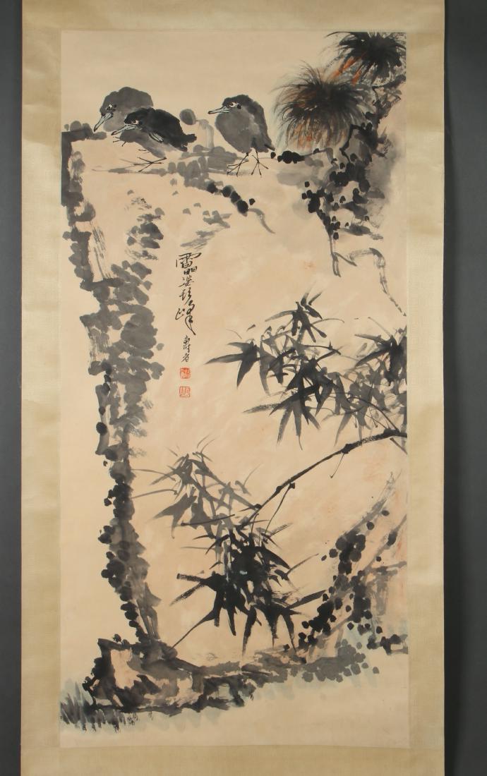 SCROLL OF BIRDS AND BAMBOO IN GRAYS: SCROLL OF BIRDS AND BAMBOO IN GRAYS: Three birds perch on a boulder in a bamboo garden. Calligraphy and artist mark in the middle. 83" X 35 1/2" $400 - $60