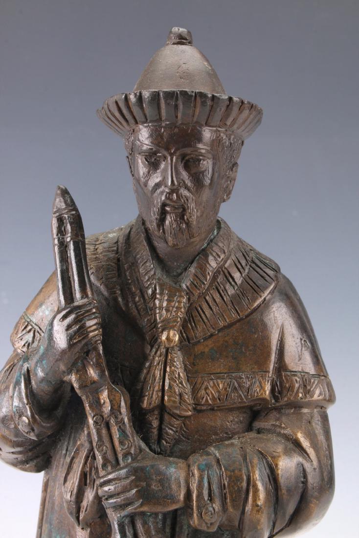 CHINESE BRONZE STATUE: CHINESE BRONZE STATUE: A man is holding garden shears and wearing boots. Speckled with verdigris. 4 1/2" X 12 3/4" $200 - $400 Shipping: