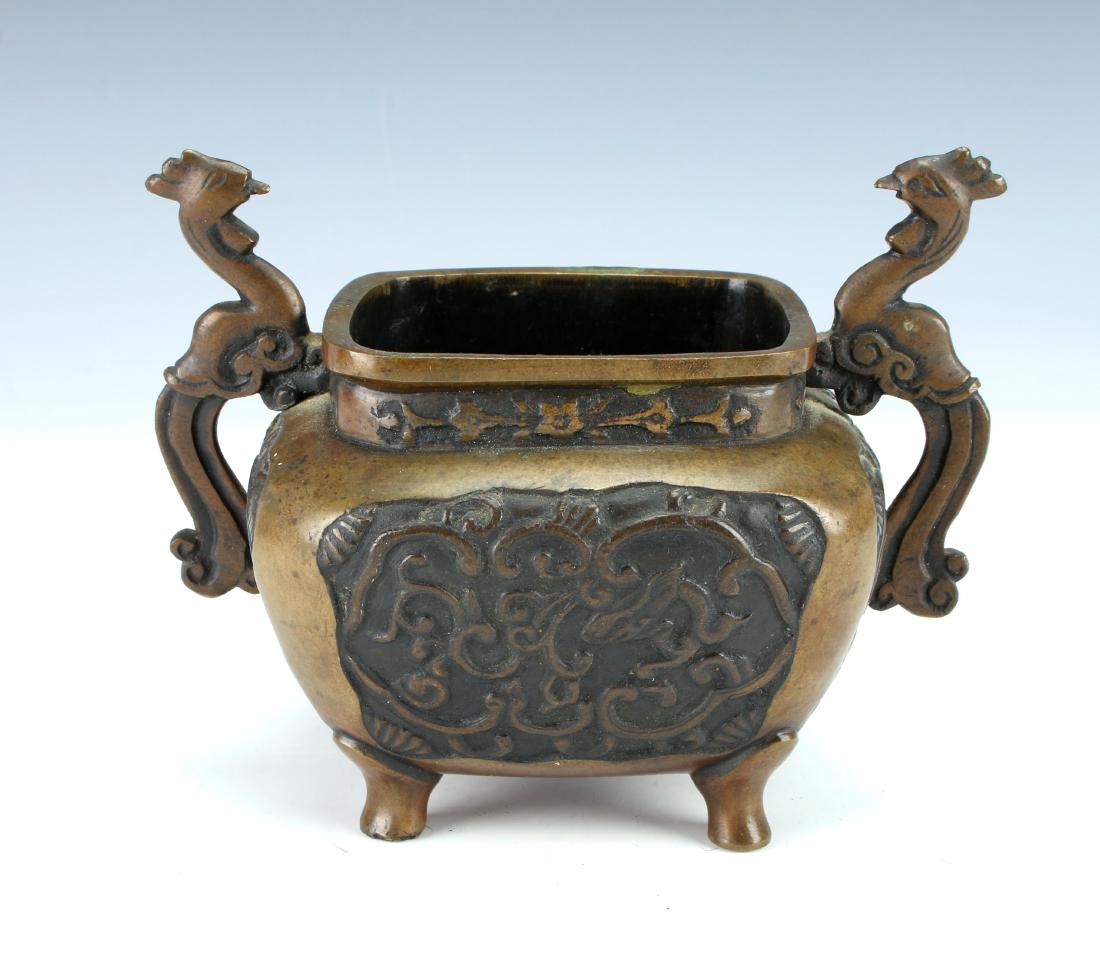 BRONZE CENSER: BRONZE CENSER: Pierced rooster handles, dragon reserves, and four feet. 5 3/4" X 4 1/4" X 4 1/4" $100 - $200 Shipping: