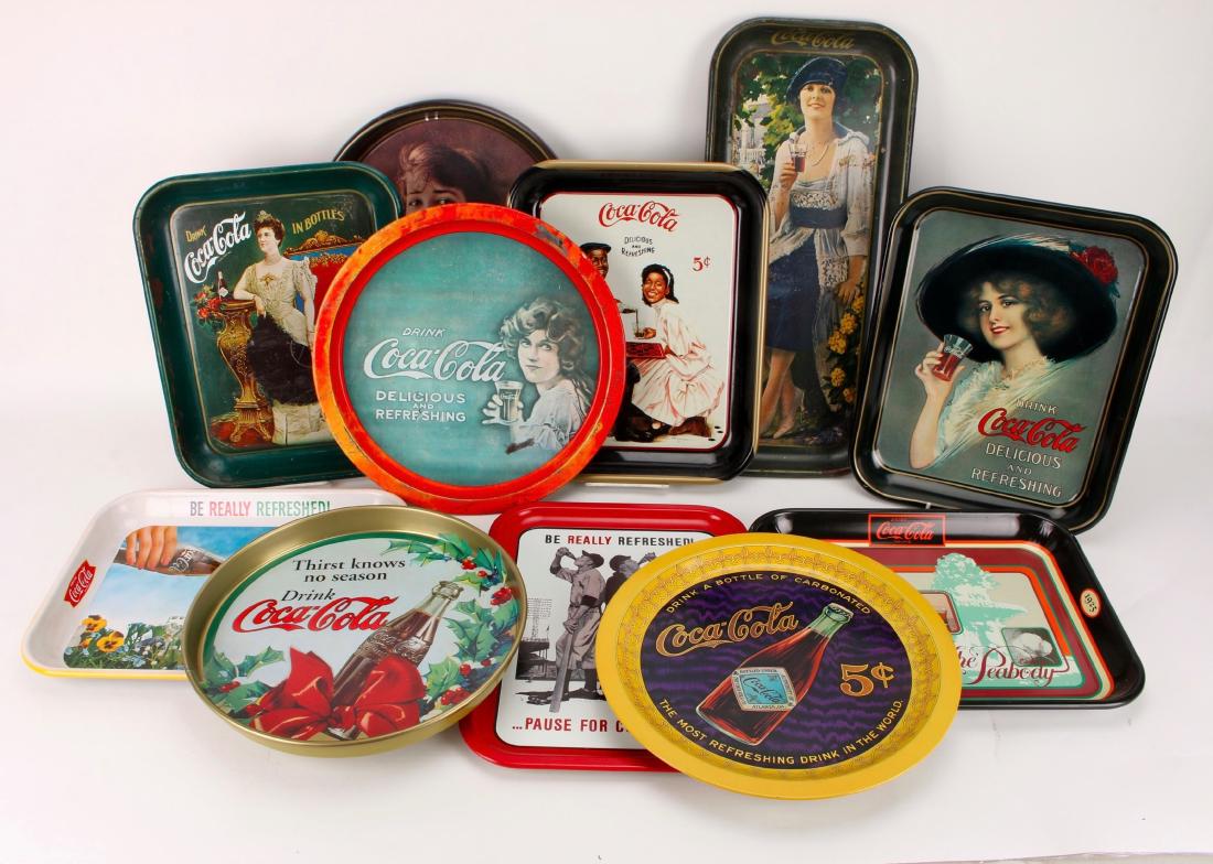 BOX OF 11 COCA COLA TRAYS: BOX OF 11 COCA COLA TRAYS: A variety of Coca Cola trays perfect for your bar or mancave. 19" $40 - $80 Shipping: We are able t