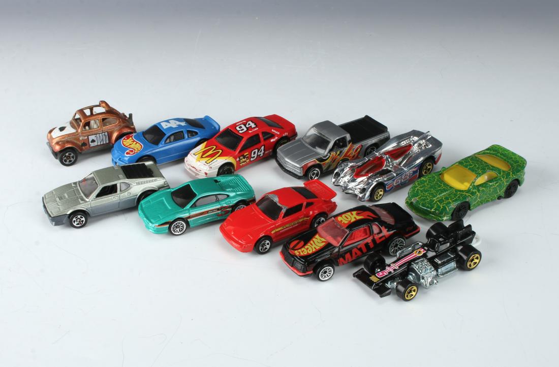 11 HOTWHEELS DIE CAST TOY CARS: 11 HOTWHEELS DIE CAST TOY CARS: Racecars, trucks, bugs, and more. One McDonald's racecar. 2" $40 - $80 Shipping: We are able to