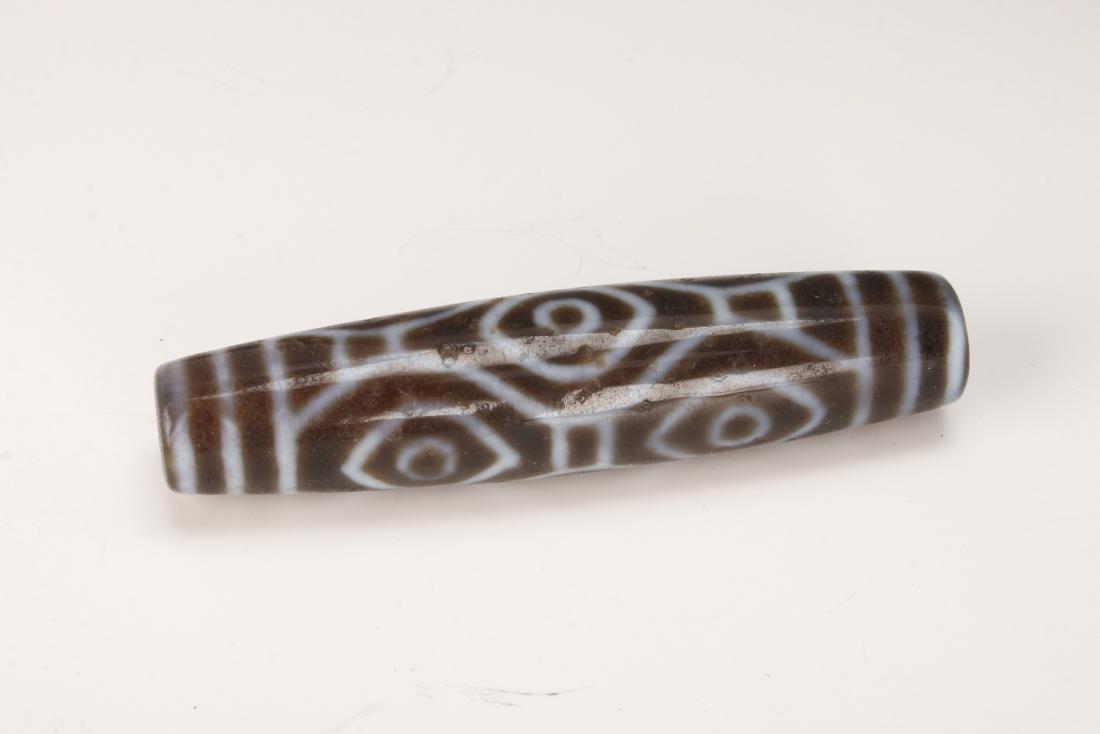 LONG SIX EYE DZI BEAD (1 of 4)
