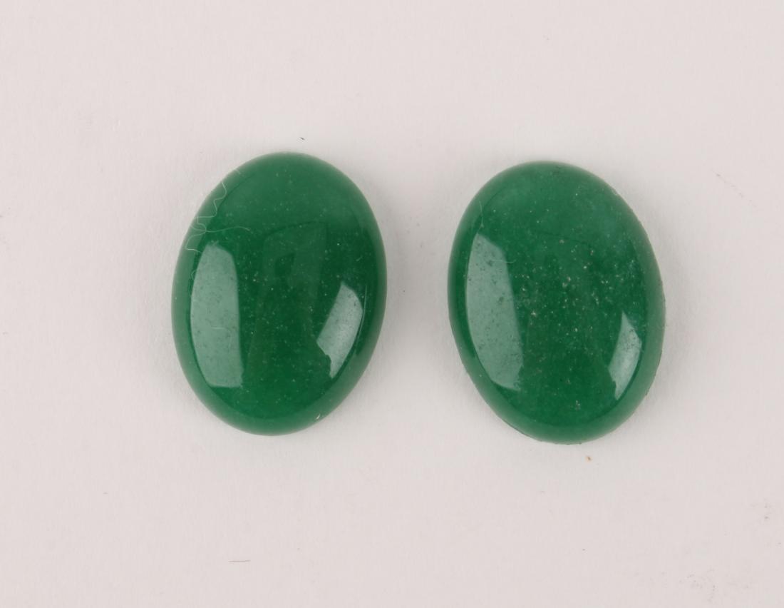 TWO SMALL OVAL GREEN JADE GEMS (1 of 4)