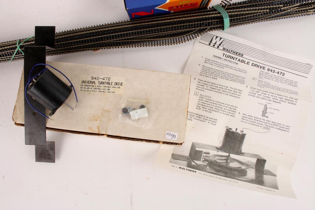 N-SCALE TRAIN TRACKS: N-SCALE TRAIN TRACKS: Including tracks, N scale turntable, and Atlas N gauge model railroad track. 36" $100 - $200 Shipping: W