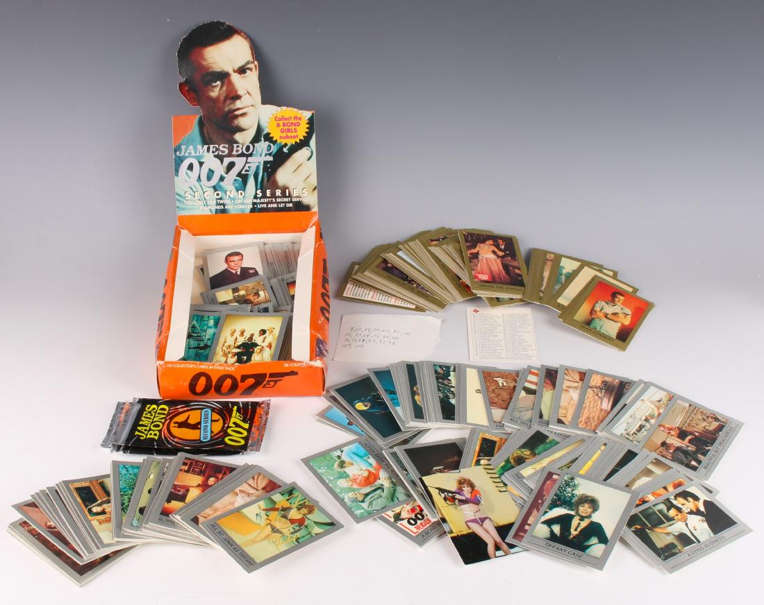 LARGE LOT JAMES BOND TRADING CARDS: LARGE LOT JAMES BOND TRADING CARDS: Diamond are forever, and so are these loose James Bond trading cards. $40 - $80 Shipping: We are able to pack and ship th