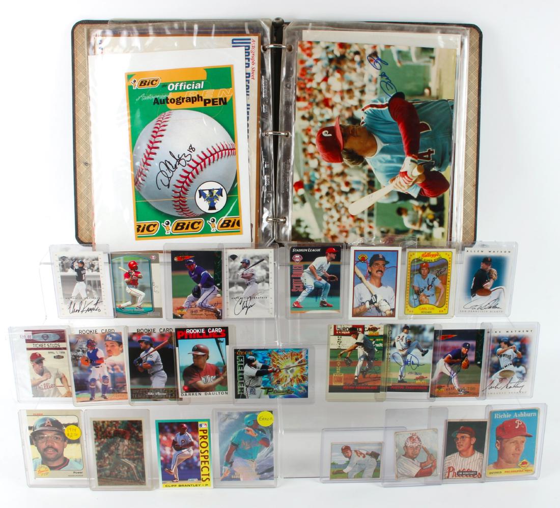 SIGNED TRADING CARDS & BINDER OF AUTOGRAPHS: SIGNED TRADING CARDS & BINDER OF AUTOGRAPHS: Including a binder of autographed photos, signed ticket stubs, and baseball cards. One error card included. $200 - $400 There are addi