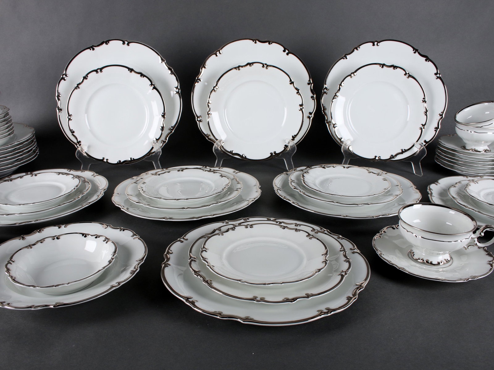 FINE HUTSCHENREUTHER-GELB CHINA SET: FINE HUTSCHENREUTHER-GELB CHINA SET: Hutschenreuther-Gelb L.F.T.S. Bavaria German Porcelain China set- beautiful mint silver band dinner set. 8 dinner plates, 8 salad plat
