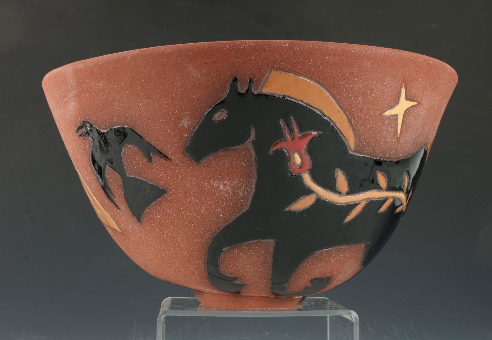 NATIVE AMERICAN GLEN LAFONTAINE BOWL: NATIVE AMERICAN GLEN LAFONTAINE BOWL: Decorated red clay bowl by Glen LaFontaine, American, born 1947. Signed and dated 2005. Black horses run under a starry sky with