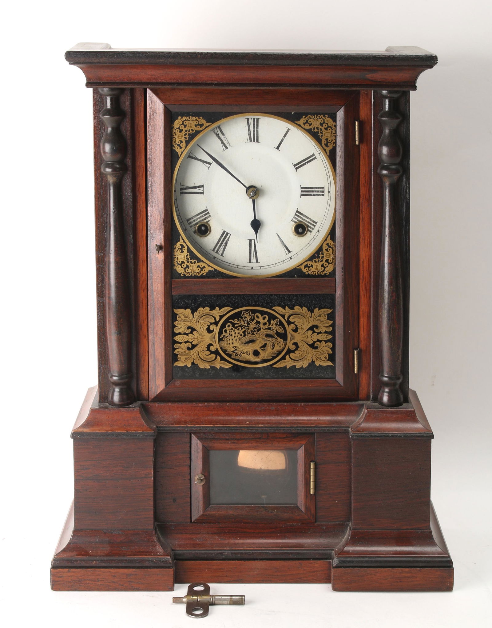 ATKINS SHELF CLOCK: ATKINS SHELF CLOCK: 30 day clock made by Atkins Clock Company Bristol Connecticut. Reverse painted glasses in black and gold, and front columns.