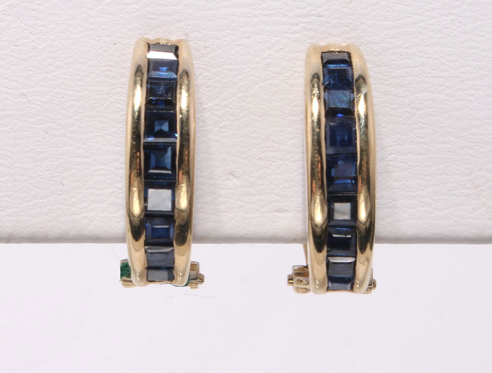 YELLOW GOLD SAPPHIRE HALF HOOP EARRINGS: Yellow gold channel set square sapphire and half hoop earrings. Simple and elegant in a classic style. Sapphire .54cts. New fine jewelry from 2nd generation Texa