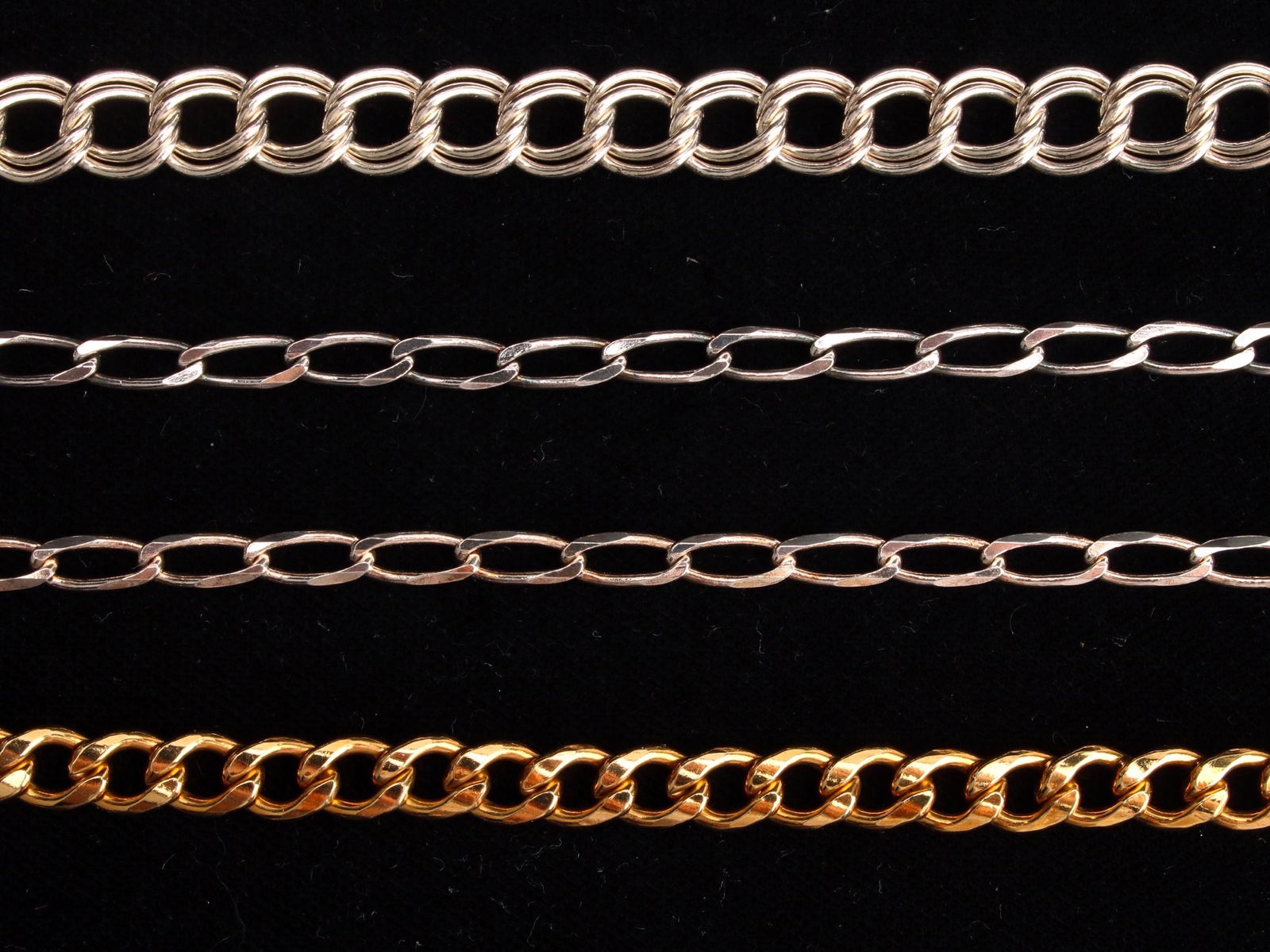 STERLING & GOLD FILLED CHARM BRACELETS: Three sterling and one gold filled charm bracelets. Two open link bracelets are 7", double open link is 6 1/2", gold filled is 8". New fine jewelr