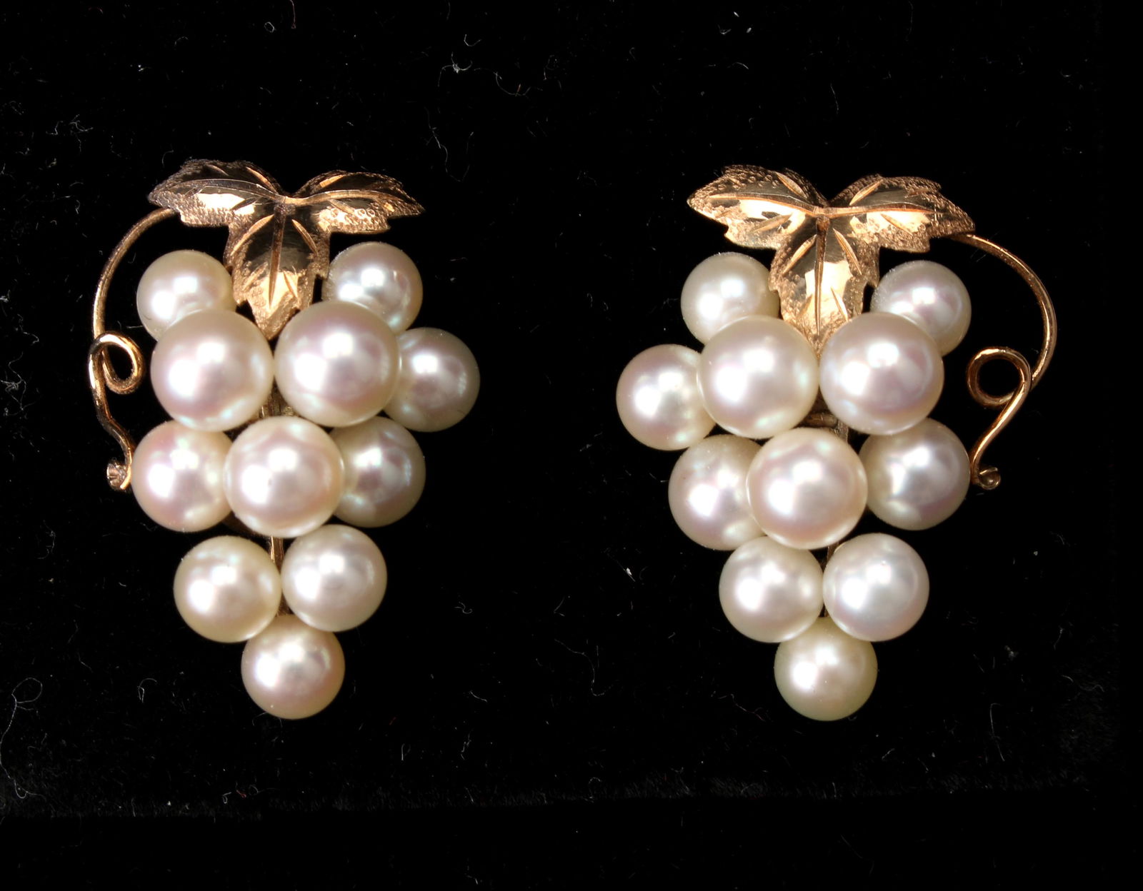 PEARL GRAPE CLUSTER EARRINGS 14K: Marked 14k. Screw back earrings, leaves and tendrils in 14k, grape clusters formed of pearls. $200 - $400 Please contact us for high resolution images of this lot. Shipping: We are able to