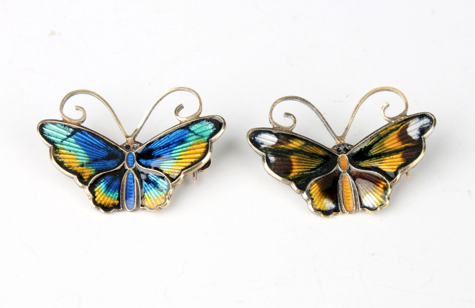 TWO VINTAGE DAVID ANDERSEN NORWAY BUTTERFLY PINS: Vintage Norwegian silver enamel butterfly pins marked David Andersen and 925 S for sterling silver. Guilloche enamel with original gold wash over sterling finish.