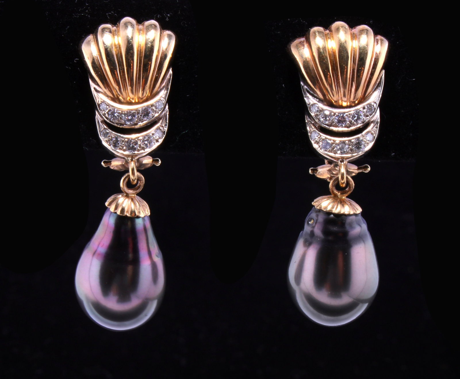 SOUTH SEA PEARL AND DIAMOND DROP EARRINGS: Lustrous teardrop Tahitian South Sea pearls hang from yellow gold and pavéd diamond scalloped tops. Elegant classic form with beautiful pearls. New fine
