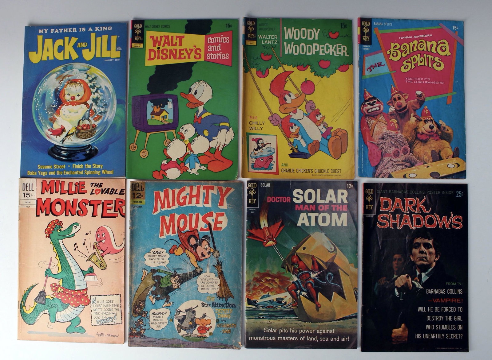 VINTAGE DELL & GOLD KEY COMIC BOOK LOT: Including Millie the Lovable Monster, Jack & Jill, Walk Disney's Comic and Stories, Mighty Mouse, Dark Shadows, Woody Woodpecker, The Banana Splits, and Doctor Solar Man of the Atom. $100 - $200 P