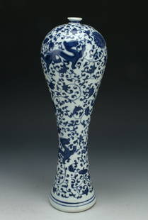 SKINNY MEIPING STYLE  BLUE & WHITE DRAGON VASE: Three dragons fly on a ground covered in flowers and tendrils. Marked on the bottom.  4&quot; X 12&quot; $40 - $80 Please contact us for high resolution images of this lot. Shipping:<