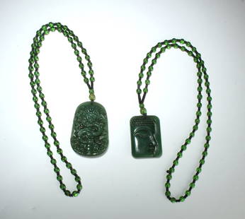 2 JADE PENDANT NECKLACES: Two jade pendants on beaded cord. $100 - $200 Please contact us for high resolution images of this lot. Shipping: We are able to pack and ship this item to an address in the United States f