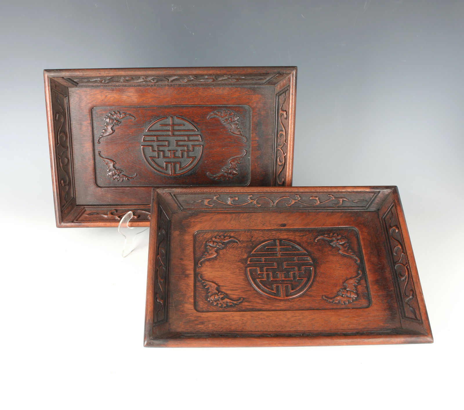 PAIR OF WOODEN CARVED CHARACTER TRAYS (1 of 4)