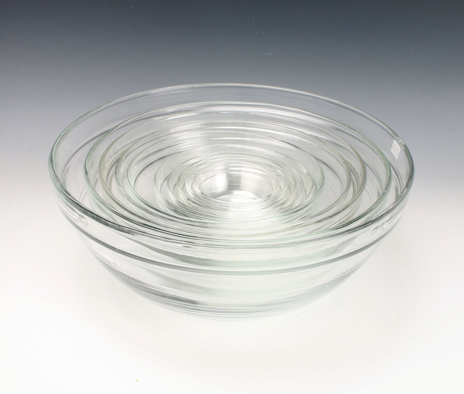 FRENCH DURALEX NESTING PYREX BOWL SET OF 10: Ten piece clear glass mixing bowl set. 12" x 5" $100 - $200 Please contact us for high resolution images of this lot. Shipping: We are able to pack and s