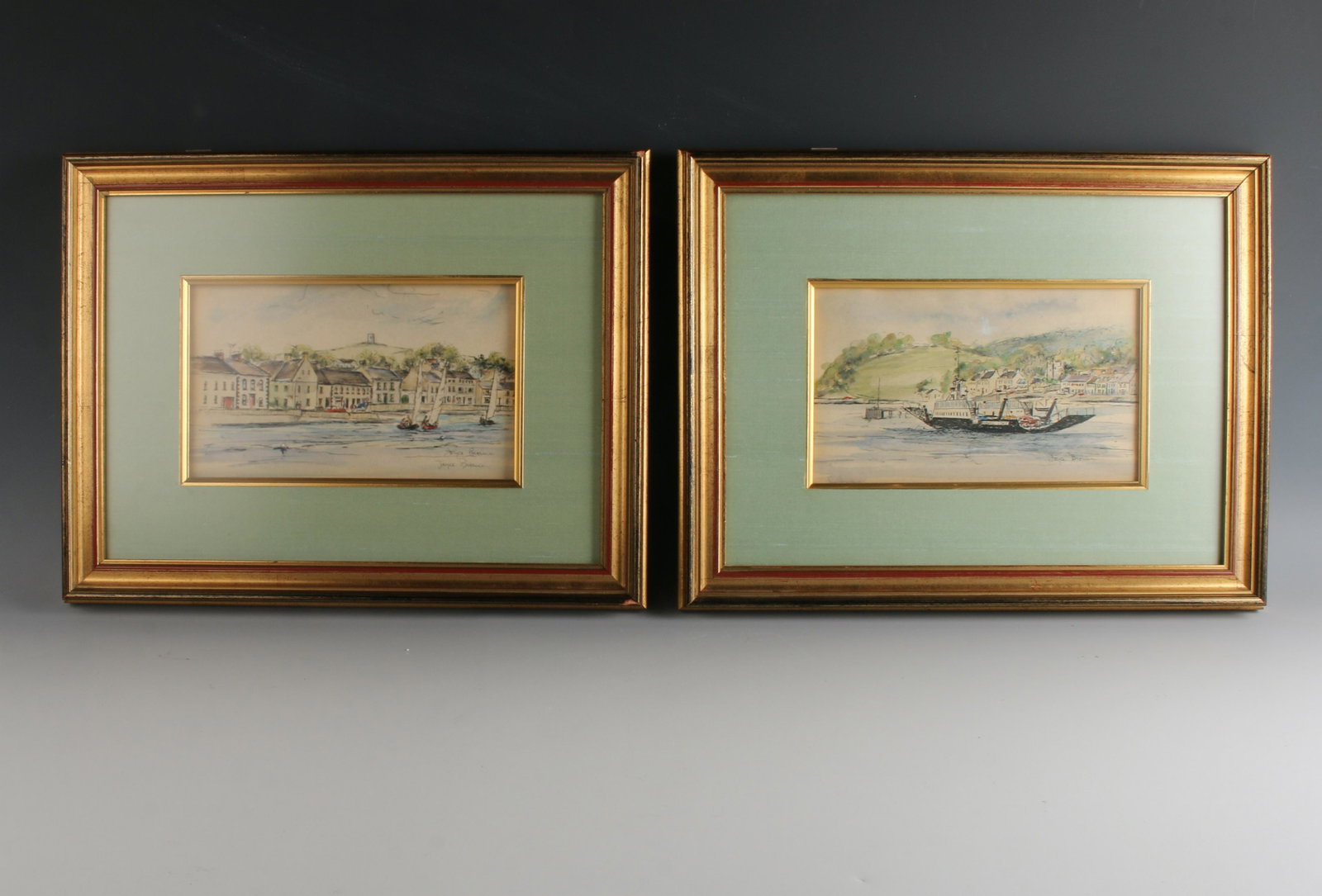 2 JOYCE BROWN WATERCOLORS OF HARBOR SCENES: Two pen and watercolor scenes by Joyce Brown "The Strangford Ferry" and "Along the Shore". Signed lower right. 15" x 12" $40 - $80 Please contact us for high resol