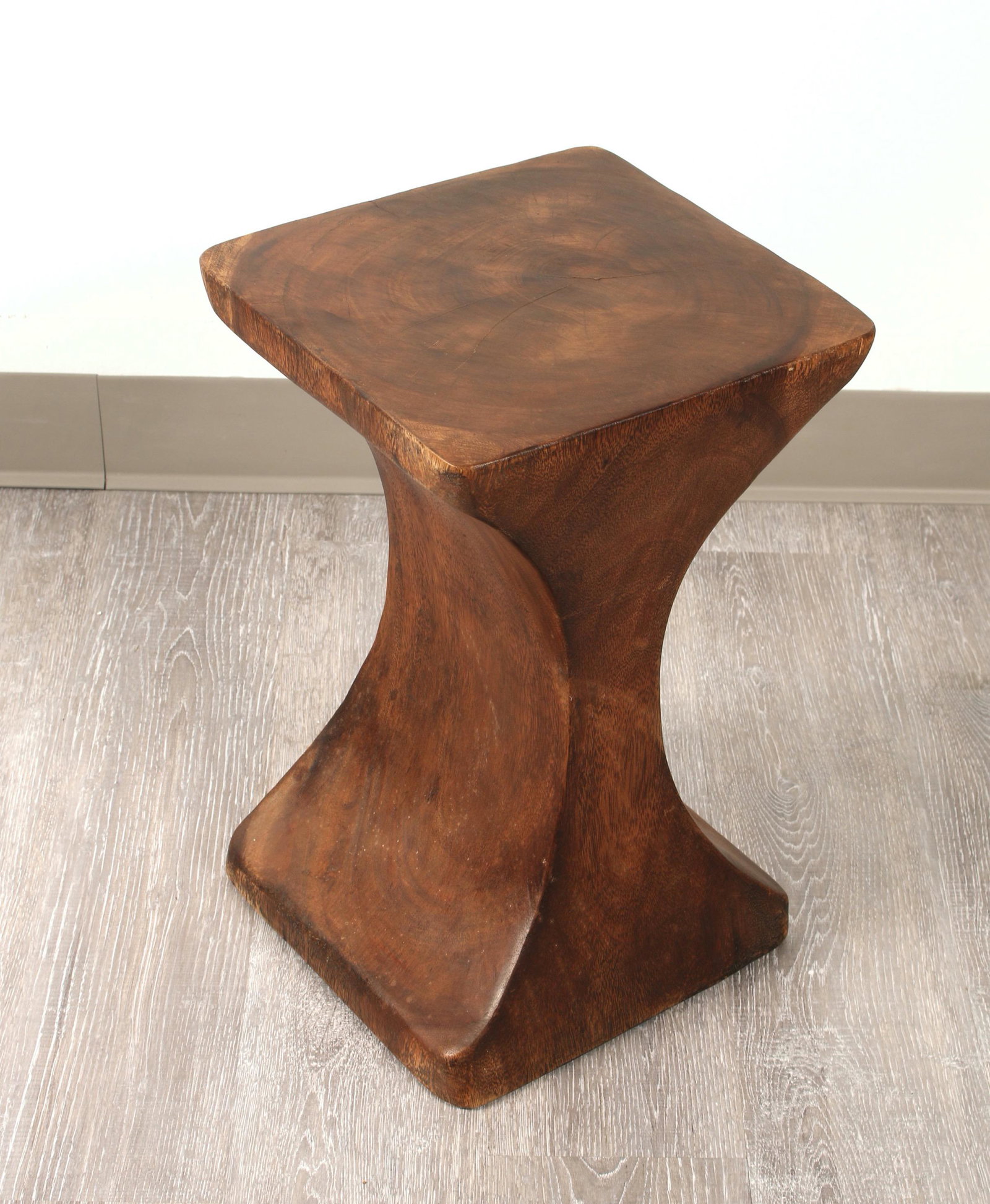 SHAPED SQUARE OCCASIONAL TABLE OR STOOL: Showing wood grain and tree rings. In contemporary scoop sided form. 11" x 11" x 18" $300 - $500 Please contact us for high resolution images of this lot. Shipping: