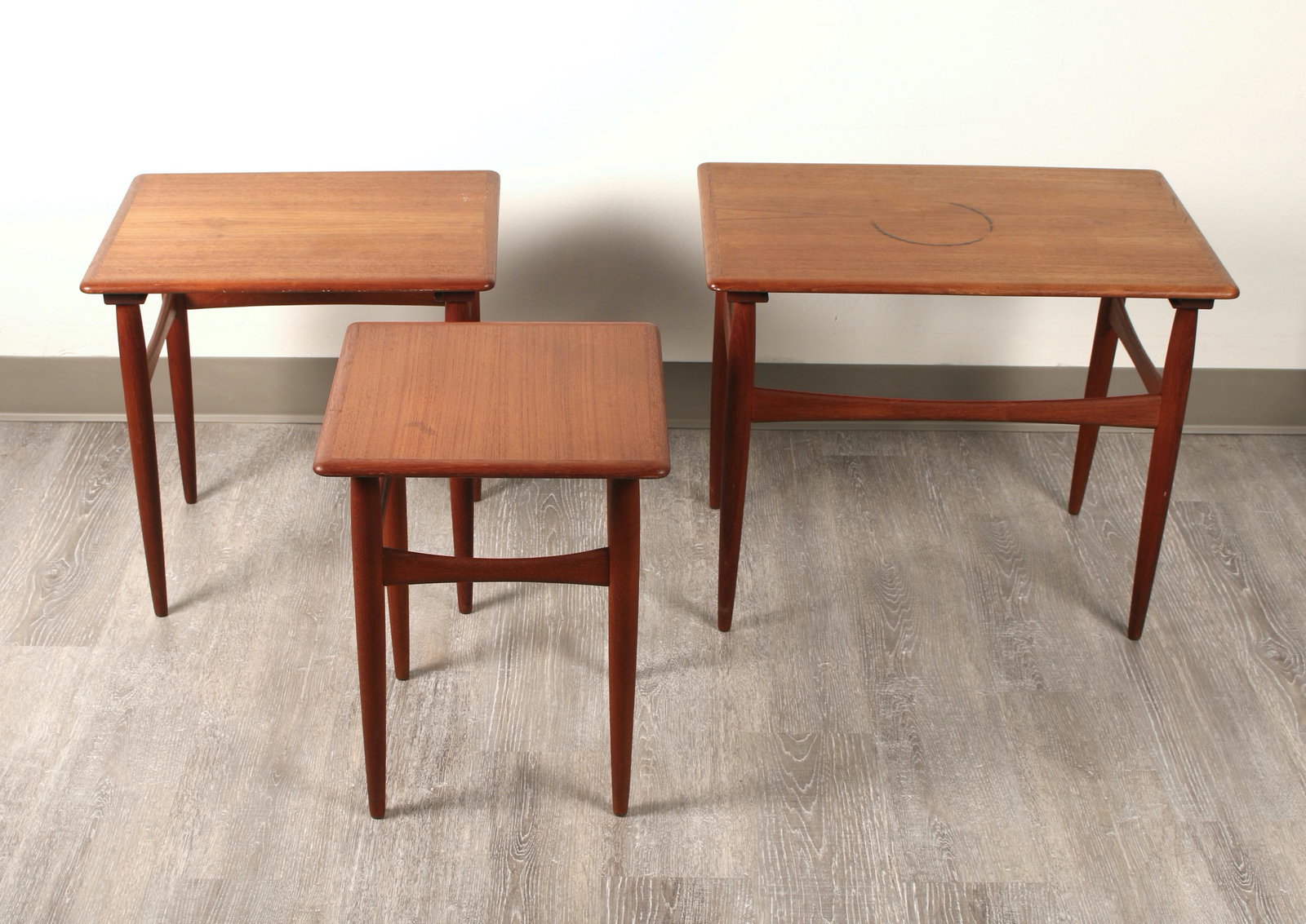 3 DANISH MID CENTURY MODERN NESTING TABLES: Mid Century Modern tables. Smallest has mark on bottom "Furnituremakers Danish Control". Other two are unmarked. 23" x 15" x 19"/ 13" x 13" x 17"/ 18" x 14