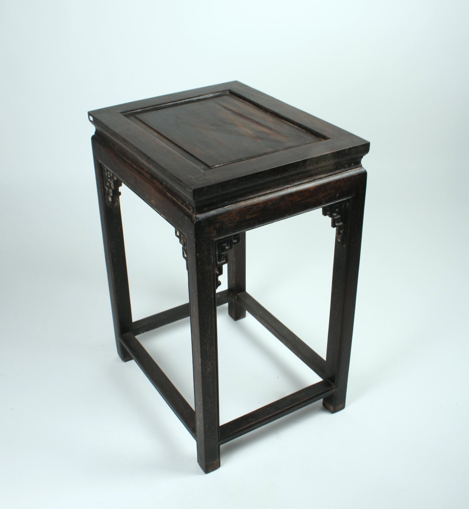 ZITAN END TABLE: Stepped flanges and a meander pattern in the corners. Provenance: From Prominent Main Line Philadelphia Estate 19