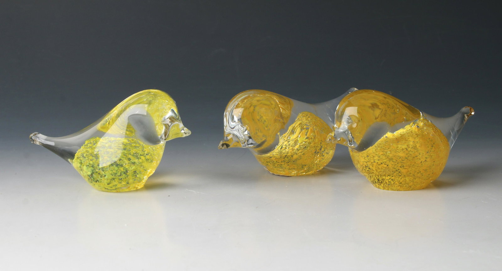 3 HAND BLOWN GLASS BIRDS RANDSFJORDGLASS MCM: Two golden yellow blown glass birds and one pale yellow. Mid century modern glass birds. 3 1/2" $100 - $200 Please contact us for high resolution images of this lot. Shipping: