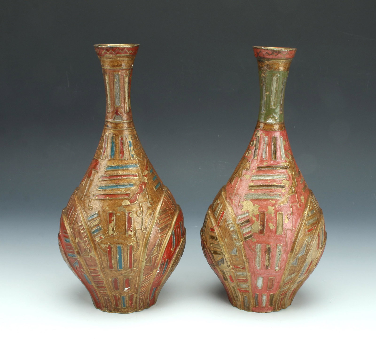 2 MIDDLE EASTERN PAINTED BRASS VASES: Painted brass vases with chipped enamel. 10" X 5 1/4" $200 - $400 Please contact us for high resolution images of this lot. Shipping: We are able to pack