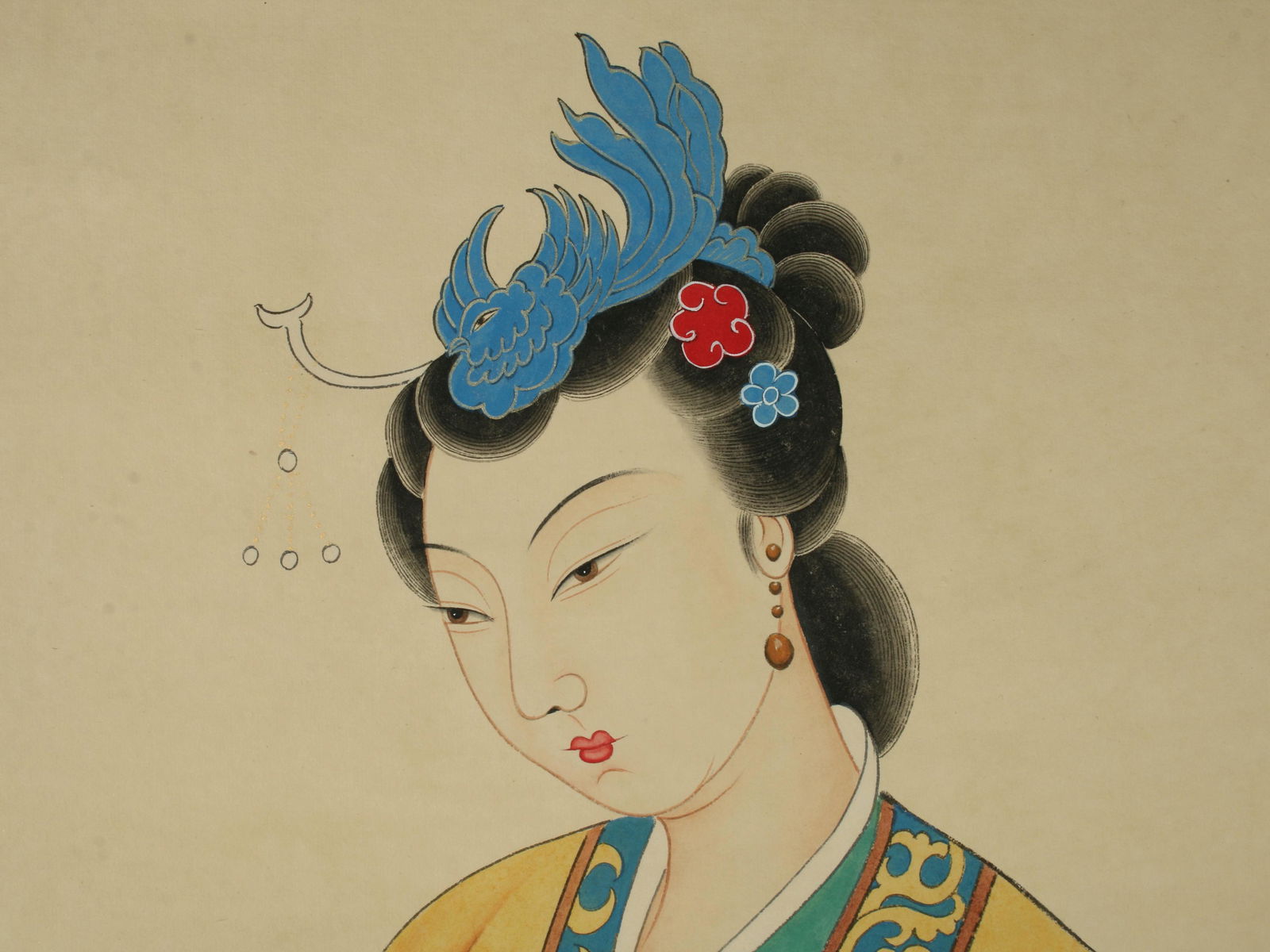 SCROLL A BEAUTY IN ROBES: A demure beauty is wearing robes with a yellow overcoat. She's holding a fan behind her and has kingfisher hair adornments. Calligraphy and artist mark on left. P