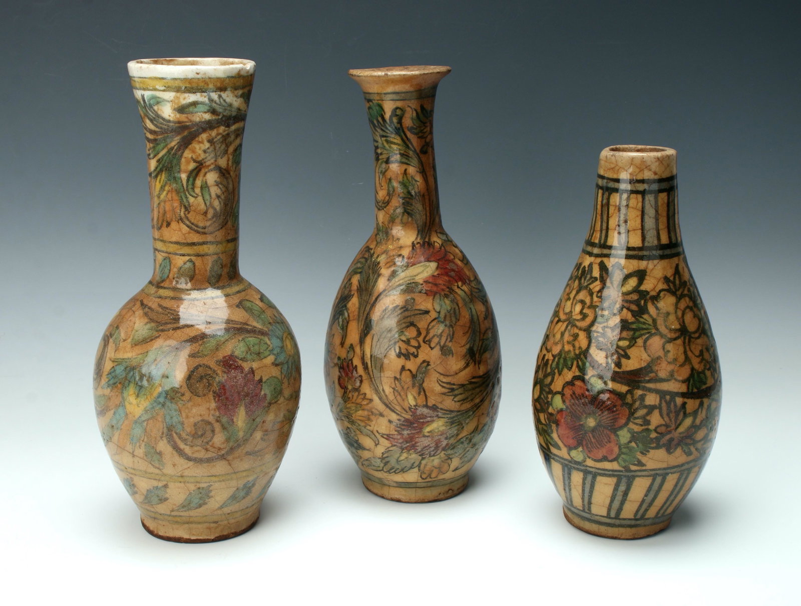 3 MIDDLE EASTERN BROWN CRAQUELURE VASES: With loose brushstrokes of flowers and leaves. 11" X 5" $200 - $400 Please contact us for high resolution images of this lot. Shipping: We are able to pa