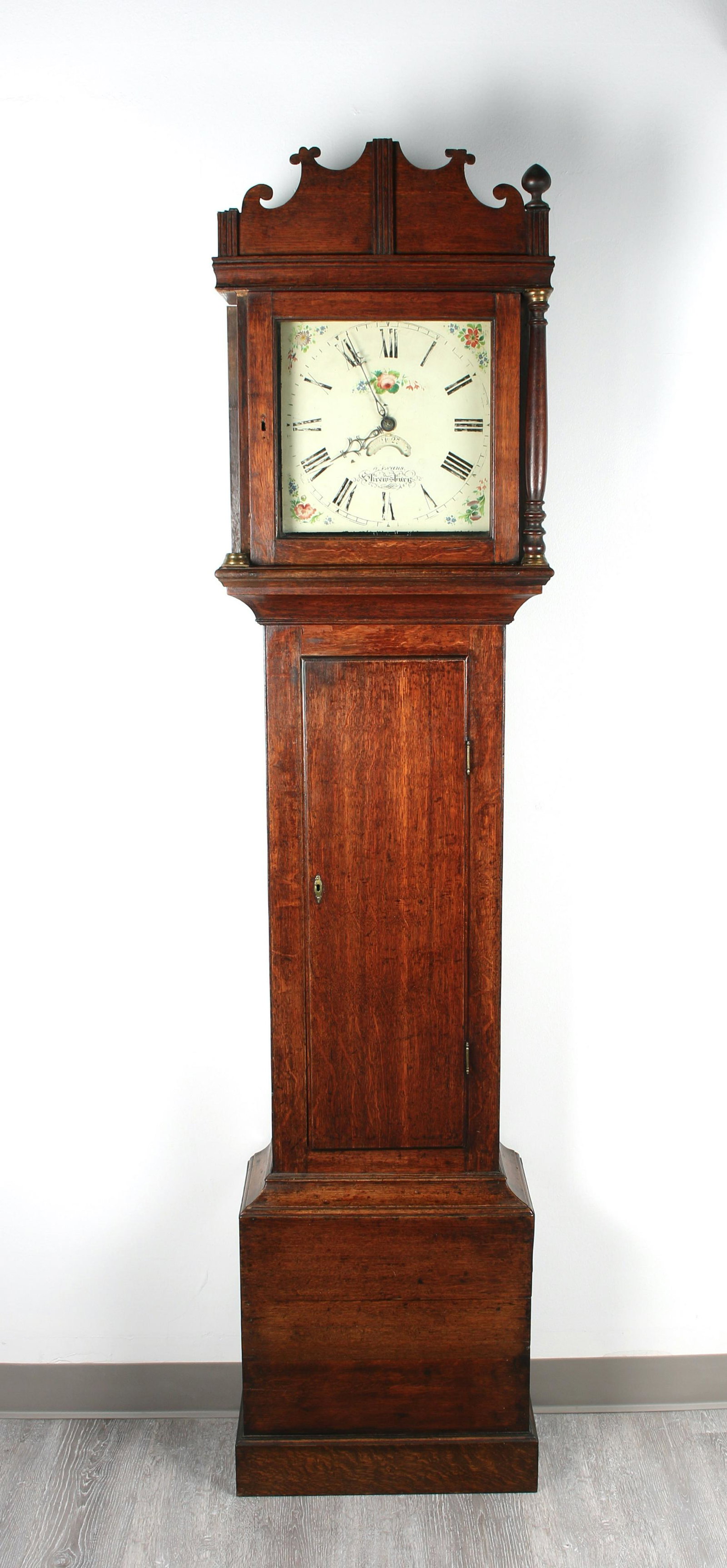 OAK 30 HOUR TALL CASE CLOCK: Painted dial marked W. Evans, Skrewsbury. The bonnet is missing left column and top finial. In quarter sawn oak. 80" x 18" x 9.5" $200 - $400 Please contact us for high resolutio