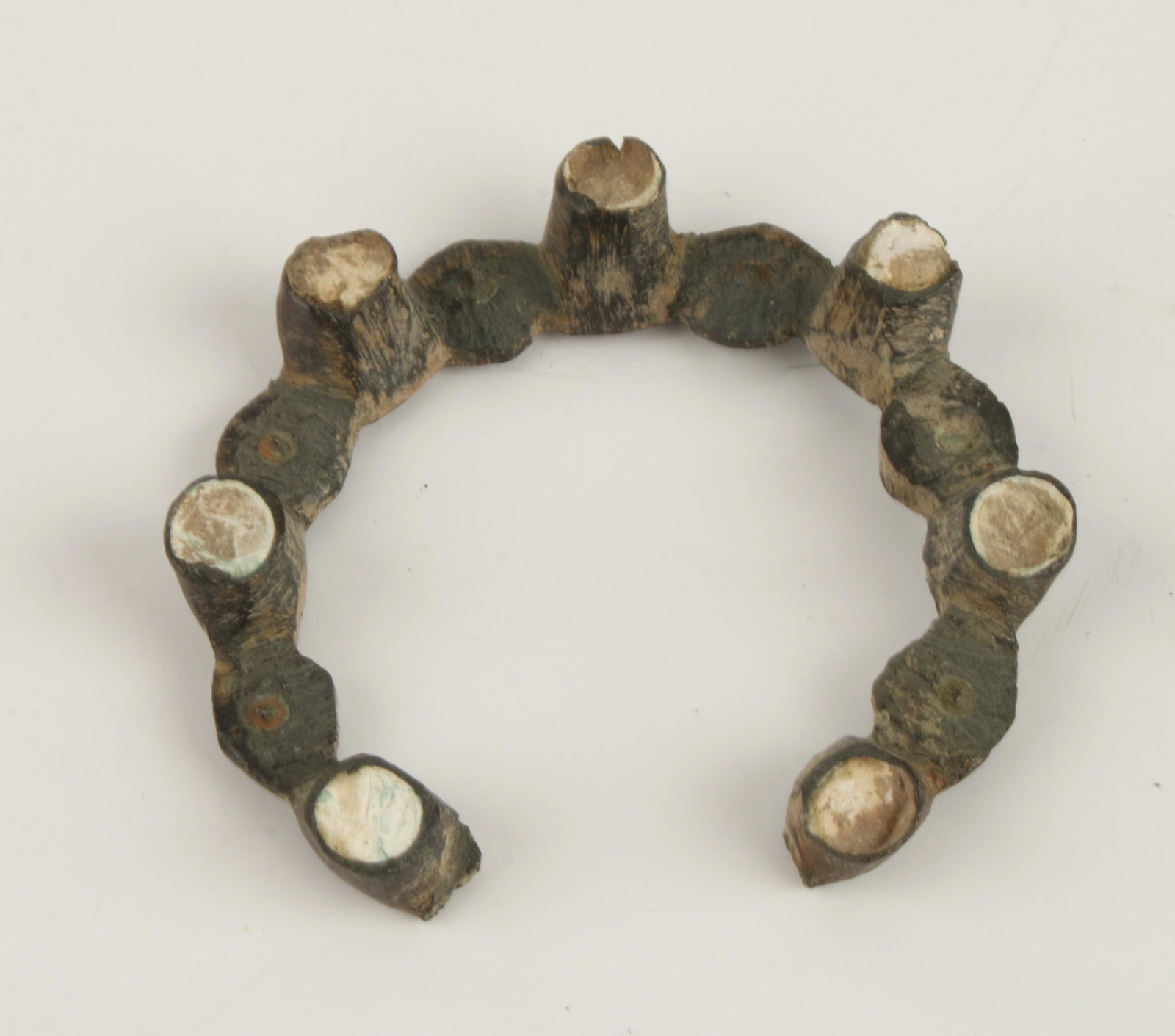 MEDIEVAL ANNULAR BROOCH 1200-1350: Has seven turrets that would have held colored stones. 1 1/2" $100 - $200 Please contact us for high resolution images of this lot. Shipping: We are able to p