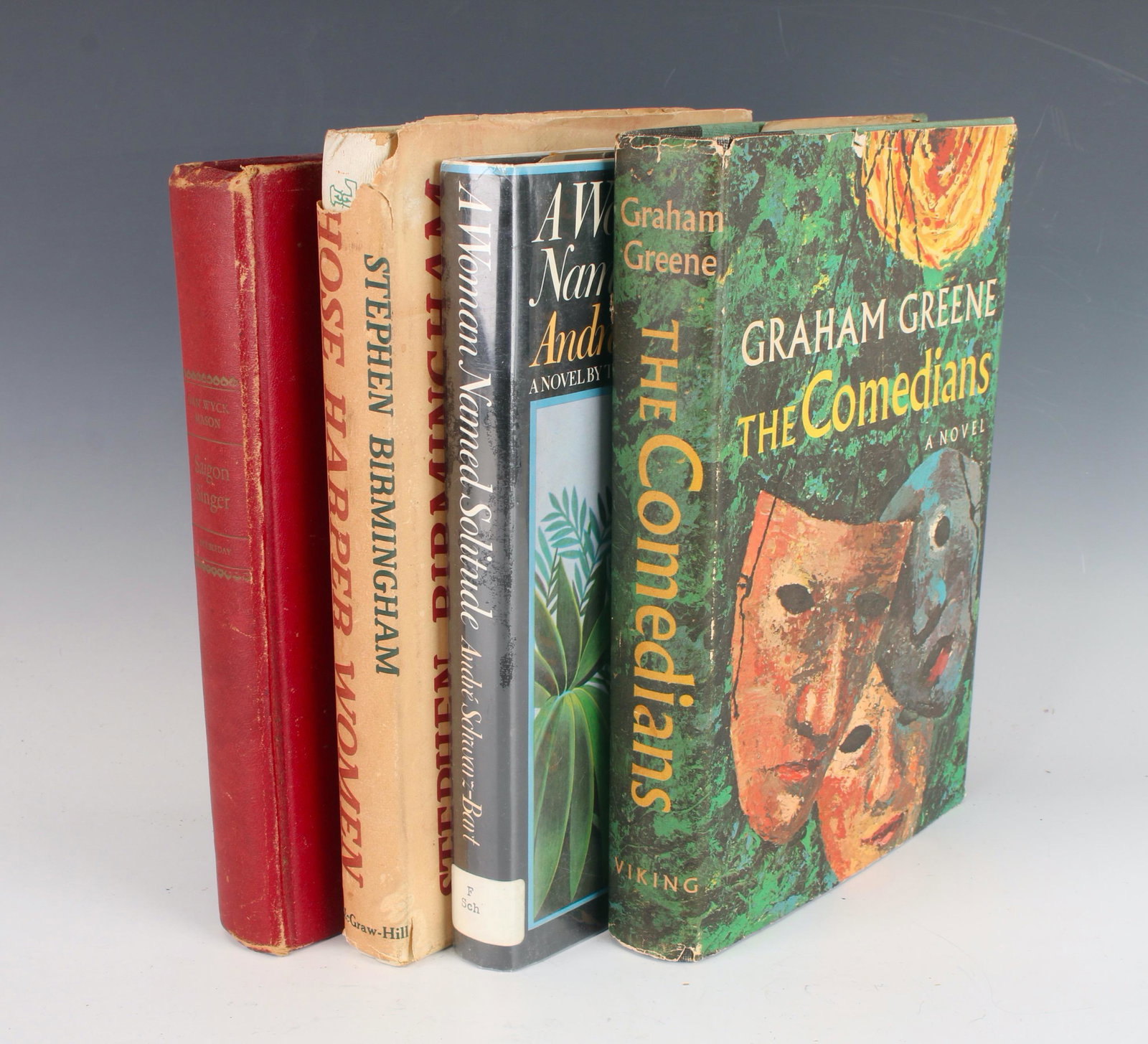 FOUR NOVELS 1946 - 1973: Saigon Singer by Van Wyck Mason. The Comedians by Graham Greene. Those Harper Women by Stephen Birmingham. A Woman Named Solitude Andre Schwarz-Bart 8 1/2" X 5 3/4" $40 - $80 Please co