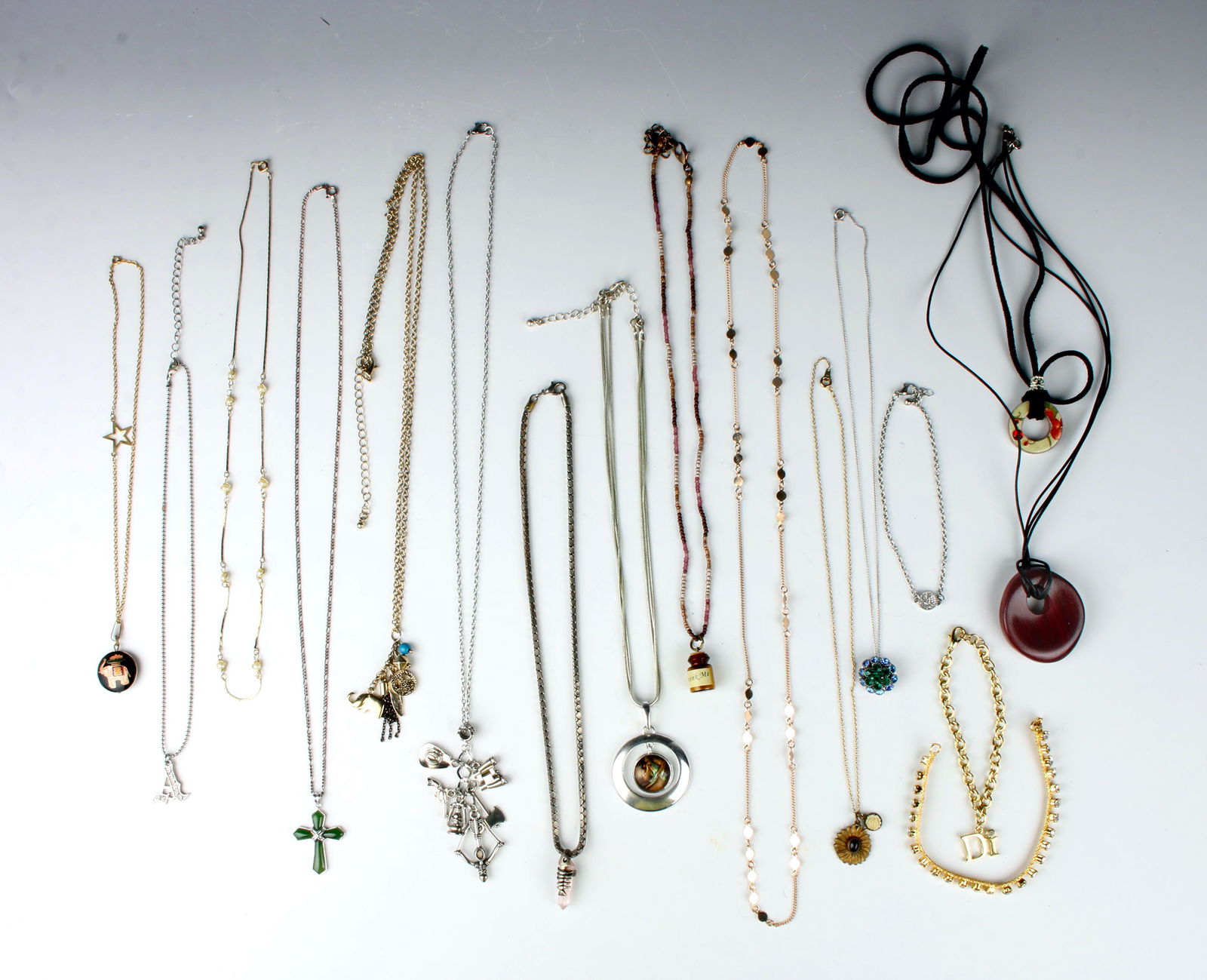 LOT OF 14 NECKLACES & 3 BRACELETS: Fourteen necklaces and three bracelets/anklets. $40 - $80 Please contact us for high resolution images of this lot. Shipping: We are able to pack and ship this item to an address in the Uni