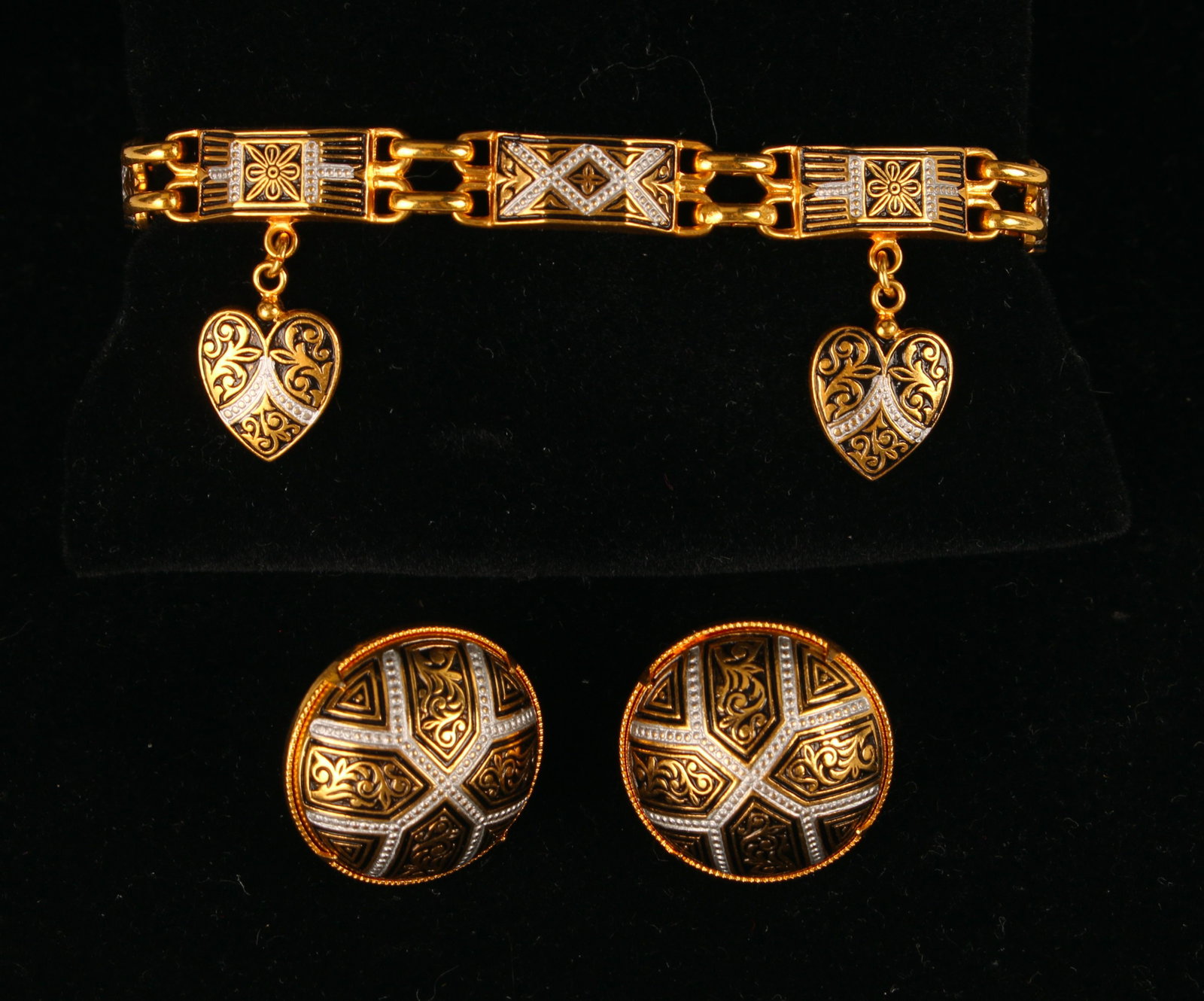 BYZANTINE STYLE ENAMEL BRACELET & EARRINGS: Bracelet has three heart charms, a tongue clasp, and a safety chain. Reproduction from Philadelphia Museum of Art shop. 7" $100 - $200 Please contact us for high resolution images of this